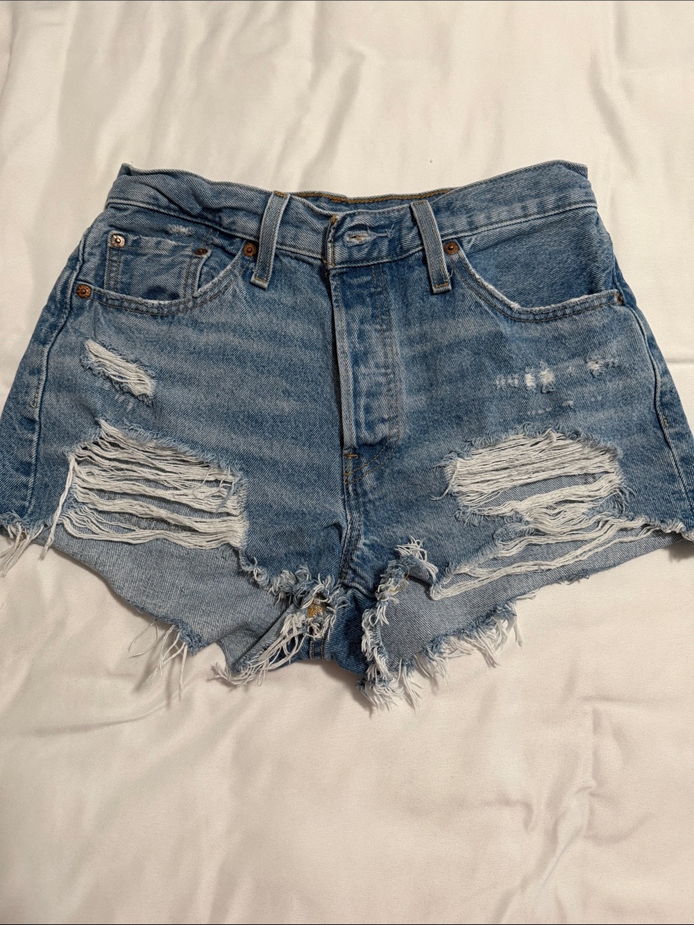 Levi's Distressed Light Blue Denim Cutoff Shorts